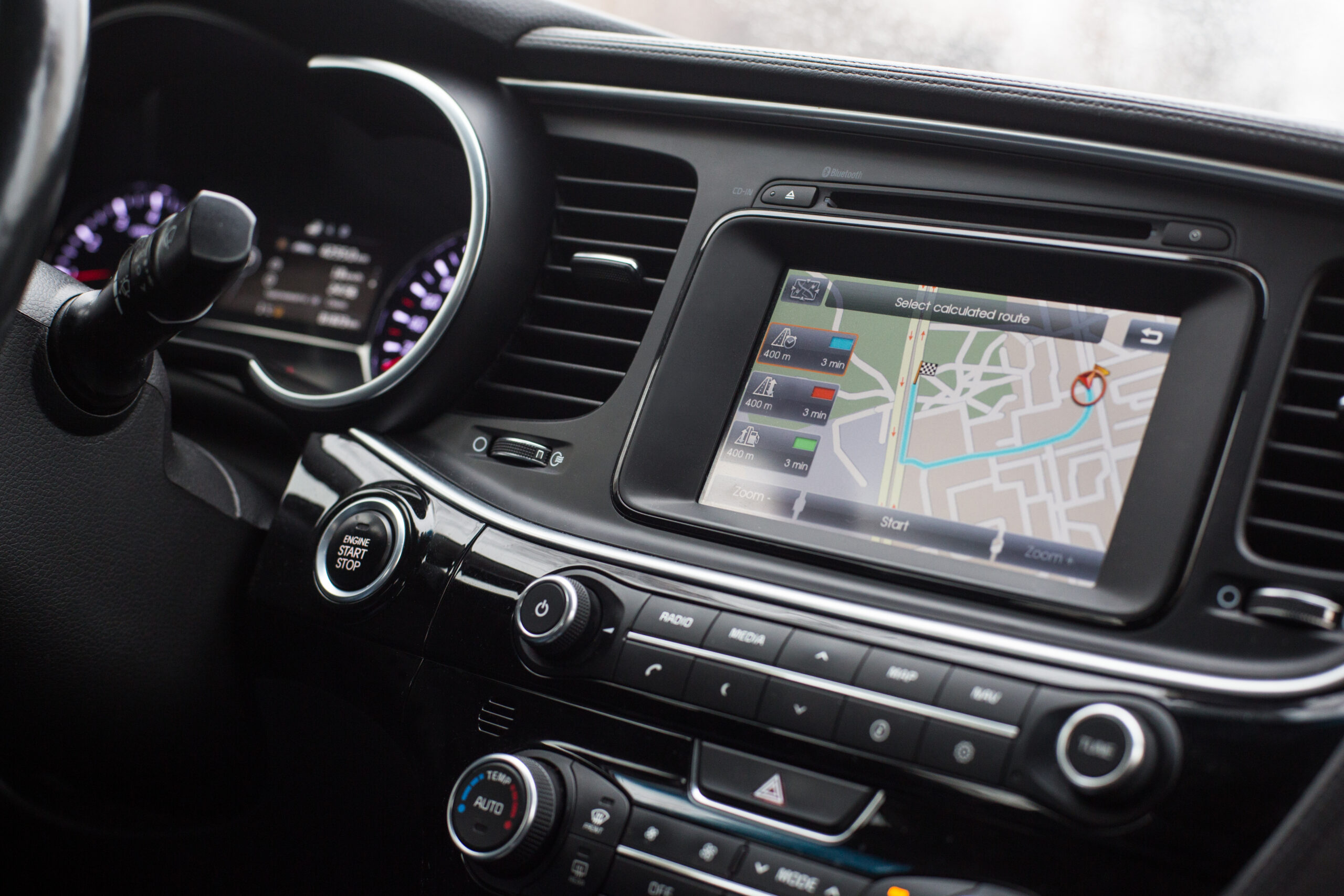 gps with the route on the dashboard of a car